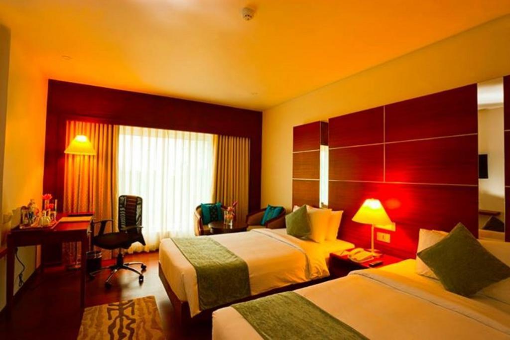 Olive Downtown Hotel Kochi Phòng bức ảnh